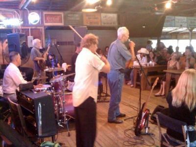 Daddy Frank singing with the band at Gruene Hall